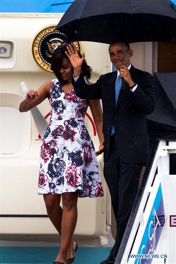 U.S. President Barack Obama(R) arrives at the Jose Marti International Airport in Havana, capital of Cuba, March 20, 2016.