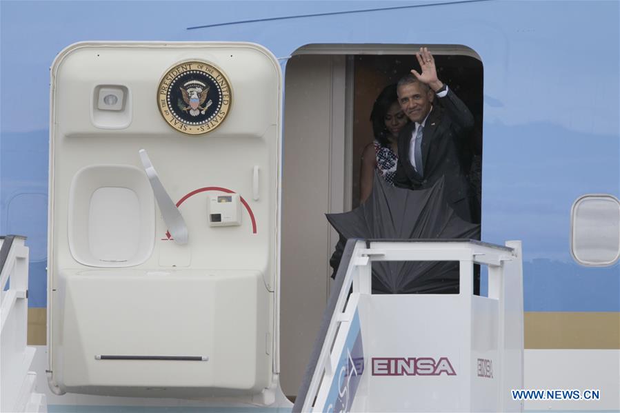 U.S. President Barack Obama(R) arrives at the Jose Marti International Airport in Havana, capital of Cuba, March 20, 2016.