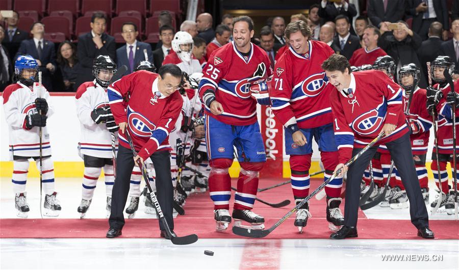 （时政）（1）李克强与加拿大总理特鲁多共同到访蒙特利尔“加拿大人”冰球队