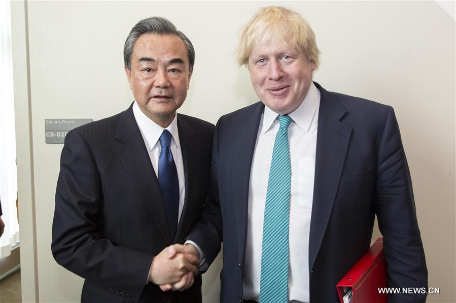 （XHDW）王毅会见英国外交大臣约翰逊