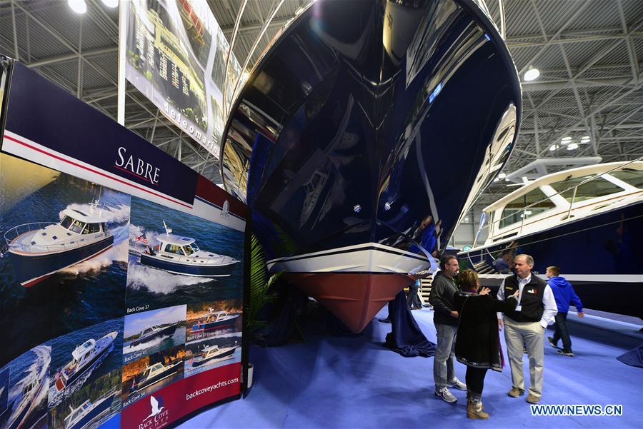 People visit New York Boat Show in New York, the United States, on Jan. 6, 2016. 