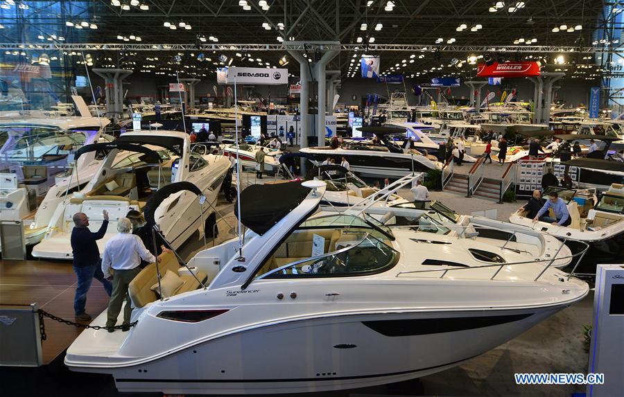 People visit New York Boat Show in New York, the United States, on Jan. 6, 2016. 