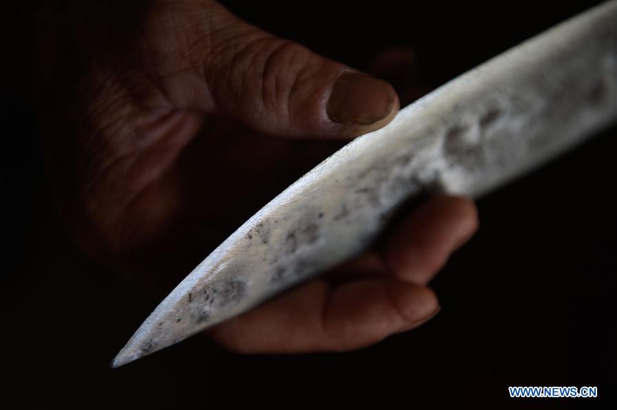 Chine : performance d'ascension sur des lames de couteaux dans le Fujian