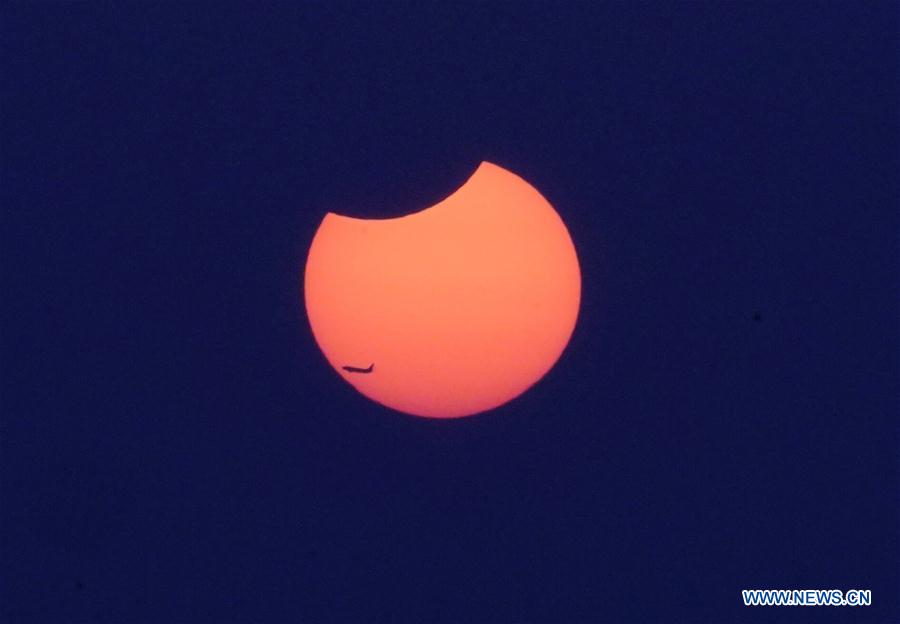 Eclipse solaire partielle observée à Beijing