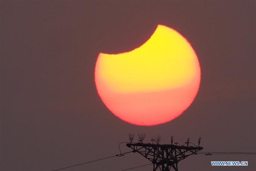 Eclipse solaire partielle observée à Beijing