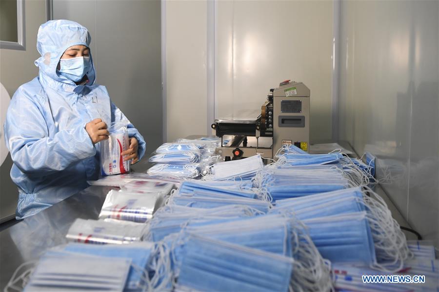 (2019-nCoV) Chine : production de masques dans une usine à Chongqing