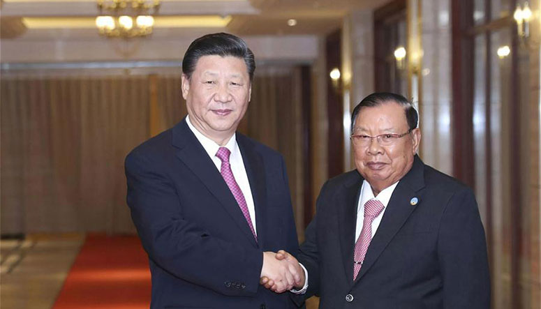 Le président chinois rencontre à nouveau son homologue laotien au terme d'une visite 
historique fructueuse au Laos