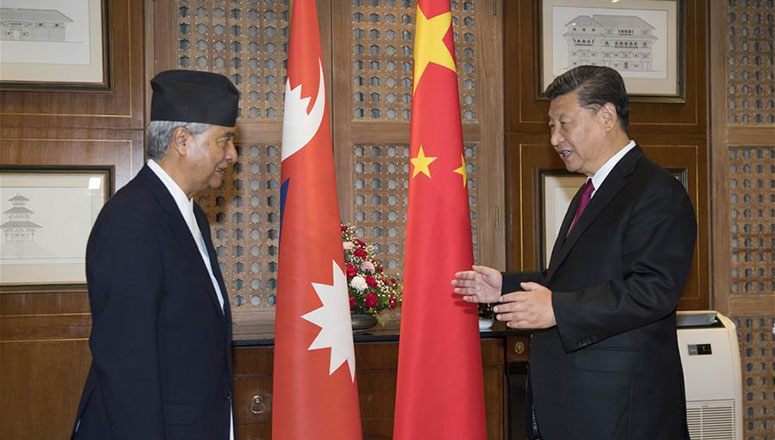 Xi Jinping rencontre le chef du parti du Congrès népalais