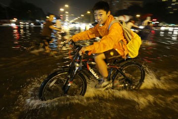 Photos: pluie torrentielle à Beijing