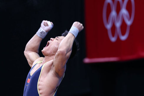 JO-2012/haltérophilie en -77 kg: médaille d'or et record du monde pour le Chinois Lu Xiaojun