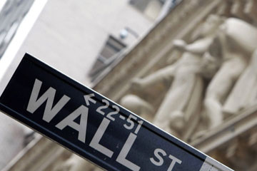 Obama appelle &agrave; de nouvelles avanc&eacute;es dans la r&eacute;forme de Wall Street