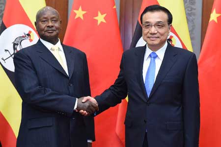 Le PM chinois rencontre le président ougandais