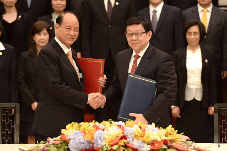 Signature d'accords entre la partie continentale de la Chine et Taiwan sur l'aviation 
et l'imposition