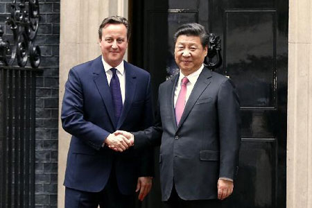 Le président chinois s'entretient avec le PM britannique