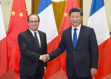 Les présidents chinois et français parviennent à un accord sur le changement climatique