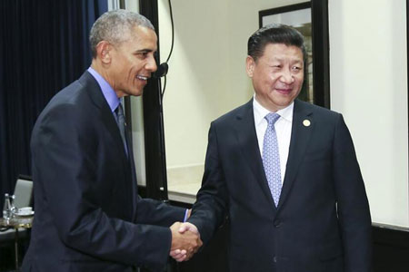 Xi Jinping et Barack Obama conviennent de maintenir le développement ferme et stable 
des relations sino-américaines