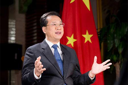 La visite du président chinois en Suisse aura un impact profond sur l'économie mondiale 
et la gouvernance internationale (INTERVIEW)