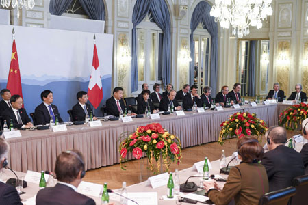 Xi Jinping appelle les milieux d'affaires chinois et suisses à renforcer leurs liens 
commerciaux