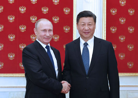 Les présidents chinois et russe conviennent de renforcer leur coordination sur des 
questions majeures