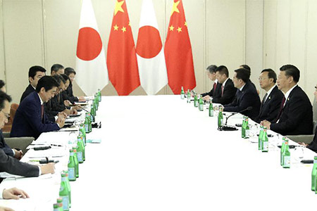Xi demande au Japon d'honorer ses engagements et de se débarrasser des obstacles 
aux relations bilatérales