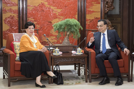 Le PM chinois rencontre l'ancienne directrice de l'OMS