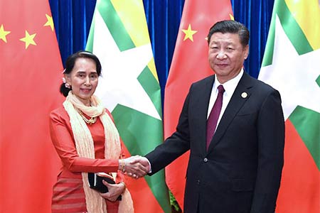 Xi Jinping rencontre Aung San Suu Kyi et appelle à davantage de coopération 
entre partis