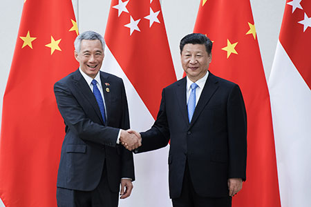 Rencontre entre le président chinois et le PM de Singapour sur la promotion des relations 
bilatérales