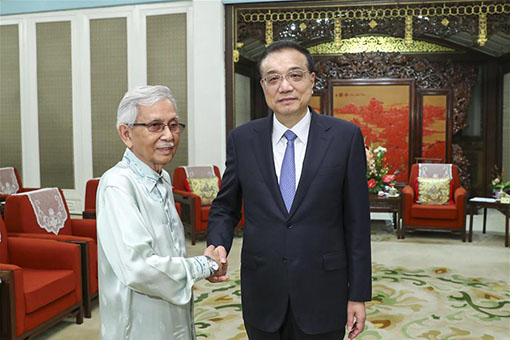 Li Keqiang rencontre l'envoyé spécial du Premier ministre malaisien