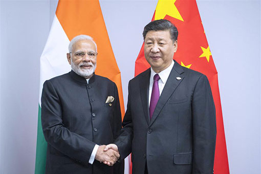 La Chine et l'Inde conviennent d'élever leurs relations bilatérales
